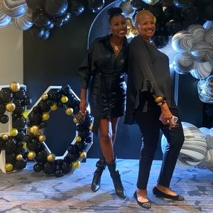 Faux leather button down black mini dress